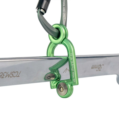 Close up of H01152 SnapLock connected to a spanner and carabiner connected to Snaplock